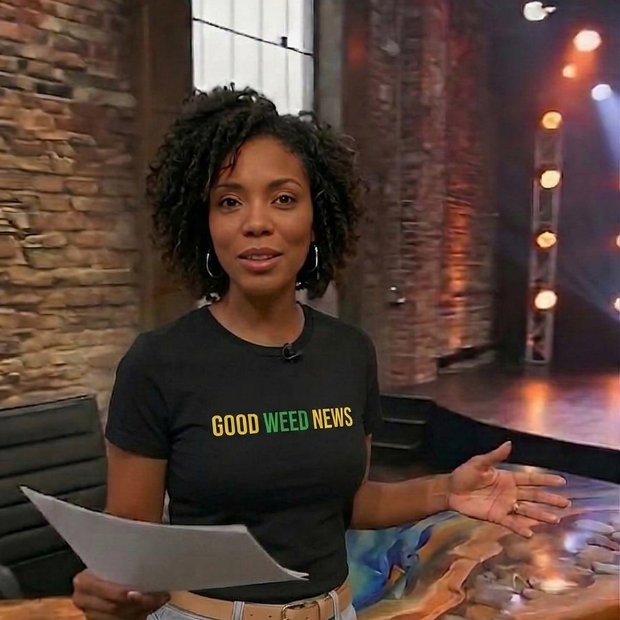 Freida Weed wearing the black Good Weed News tee in the studio